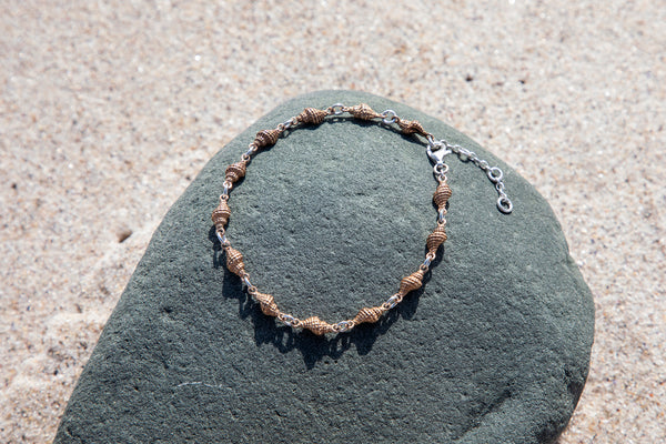 Tiny Papery burnupena shell tennis bracelet